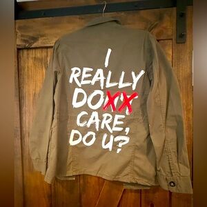 Olive Green Jacket with Bold White and Red Text